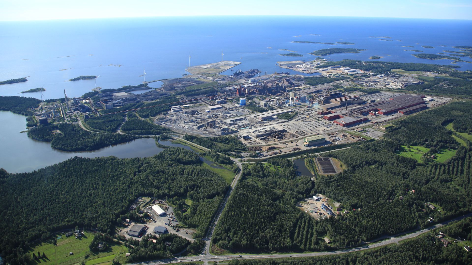 Aerial view of the steel mill and port area.