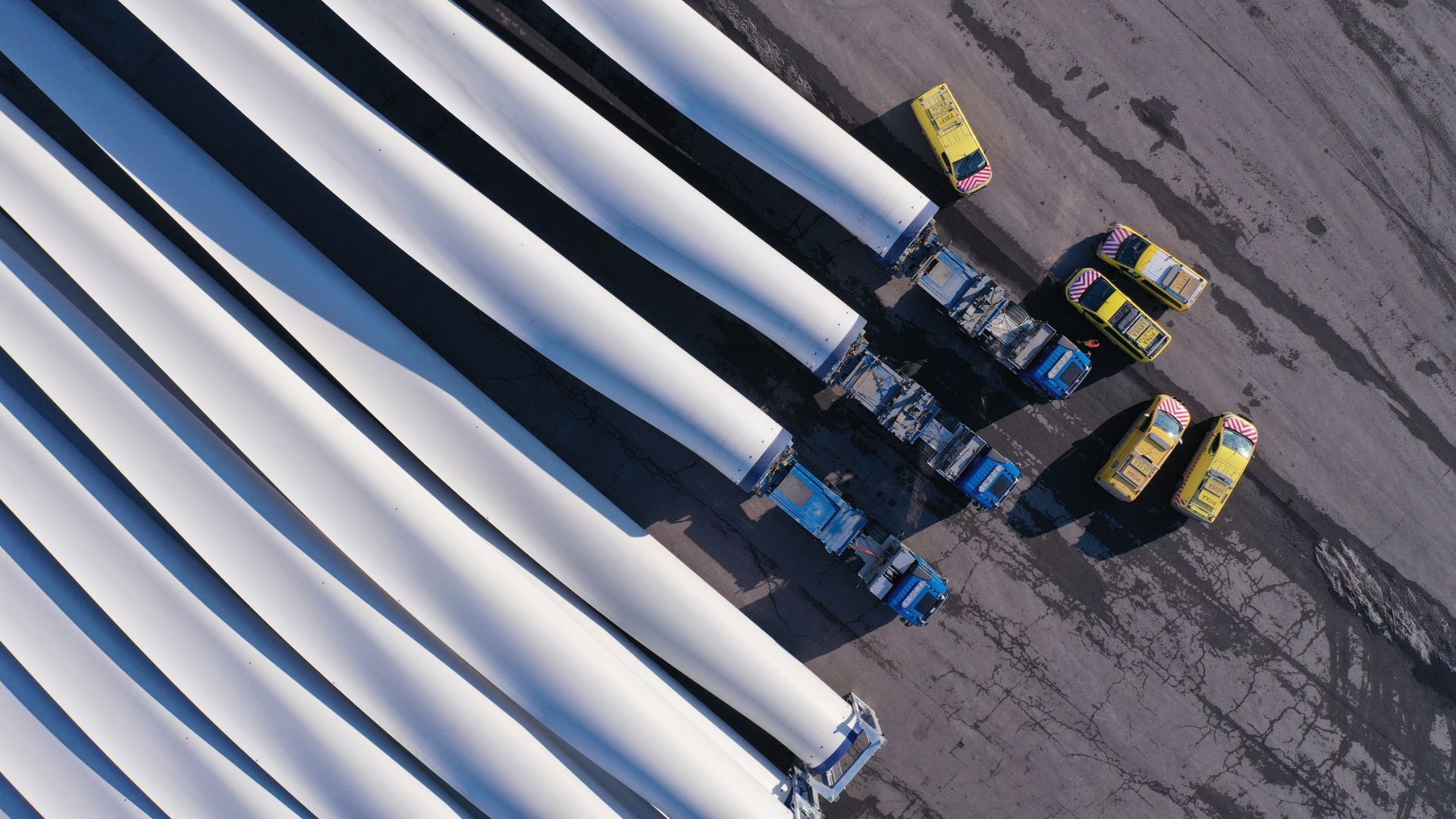 Wind turbine blades at a transport yard.
